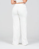 White wide-leg pants worn by a person on a white background