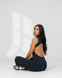 Softline | High-Neck Sculpted Backless Jumpsuit – Onyx Shadow